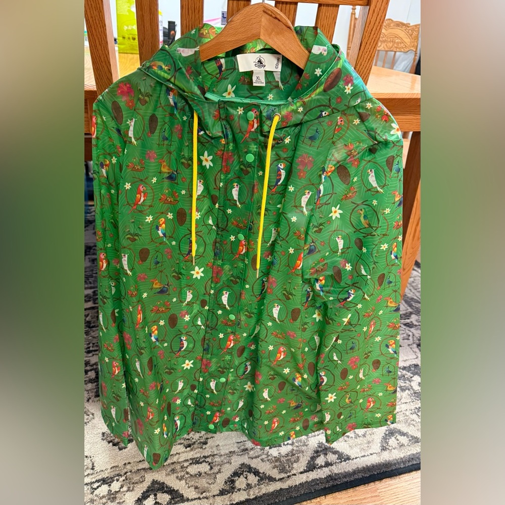 Disney vinyl enchanted tiki bird rain jacket.